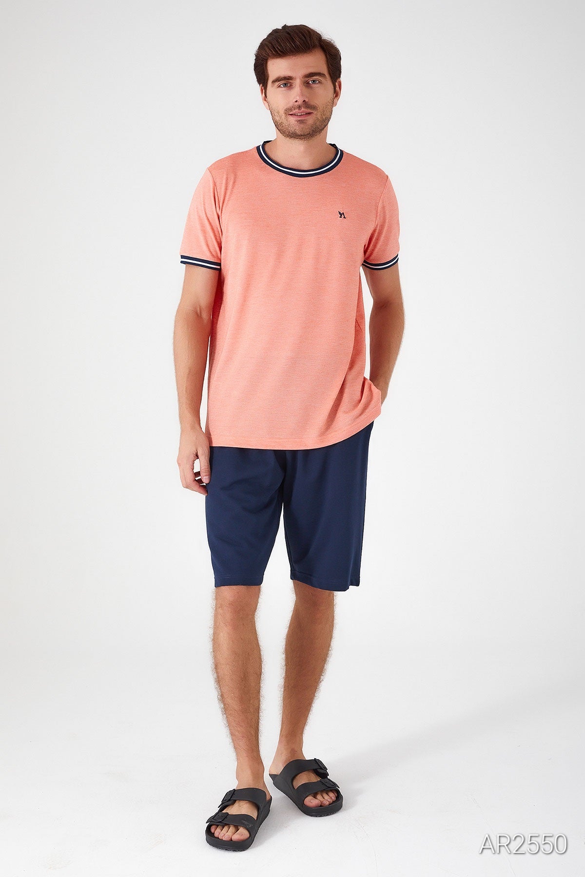 Front view of the Popjammies men's pyjama set, featuring an orange top and blue shorts.