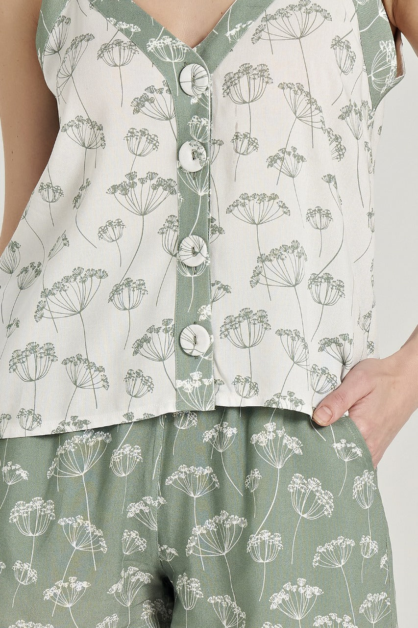  Close-up of the floral print and button details on Popjammies Floral Bliss Pyjama Set in green.