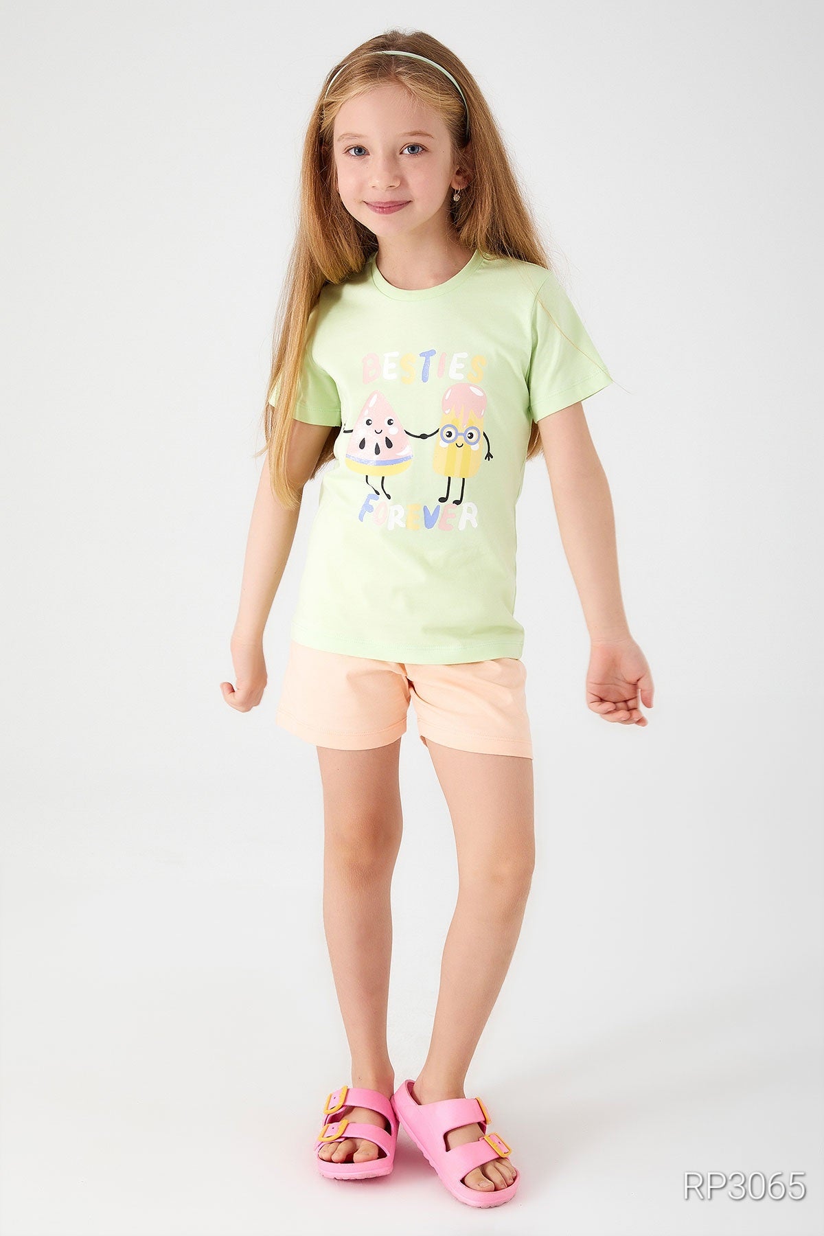 Front view of Popjammies 'Friends Forever' Pajama Set featuring a light green top with 'Friends Forever' text and ice cream graphic, paired with pastel-colored shorts.