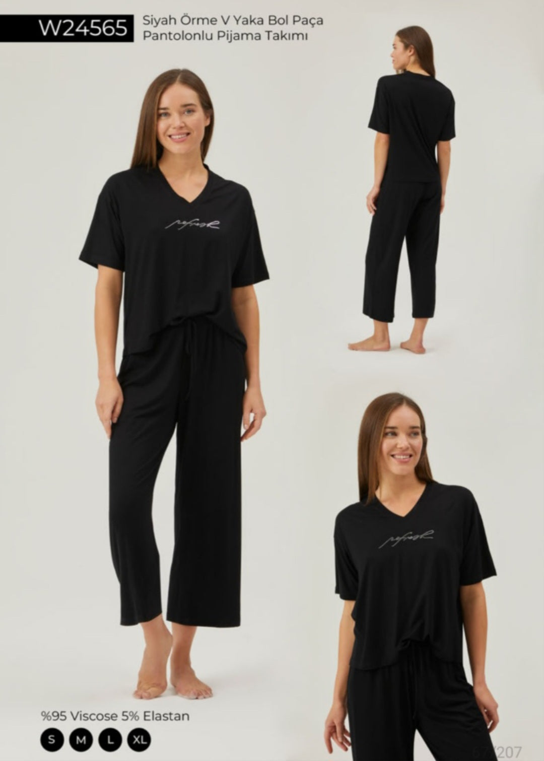 Model wearing Popjammies Black V-Neck Wide Leg Pyjama Set, showcasing a relaxed V-neck top with short sleeves and wide-leg pants, perfect for comfortable and stylish lounging.