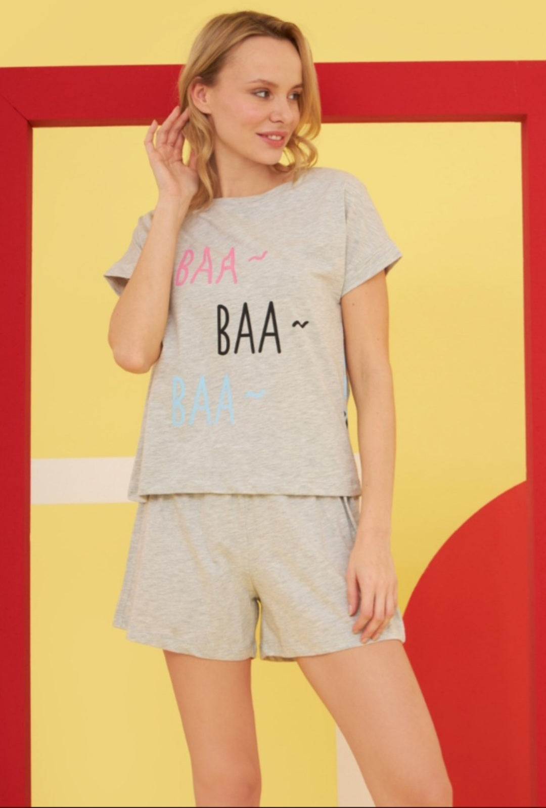 Women's 'Baa Baa' pajama set with a light grey short-sleeve top and matching shorts featuring playful 'BAA~ BAA~ BAA~' print.