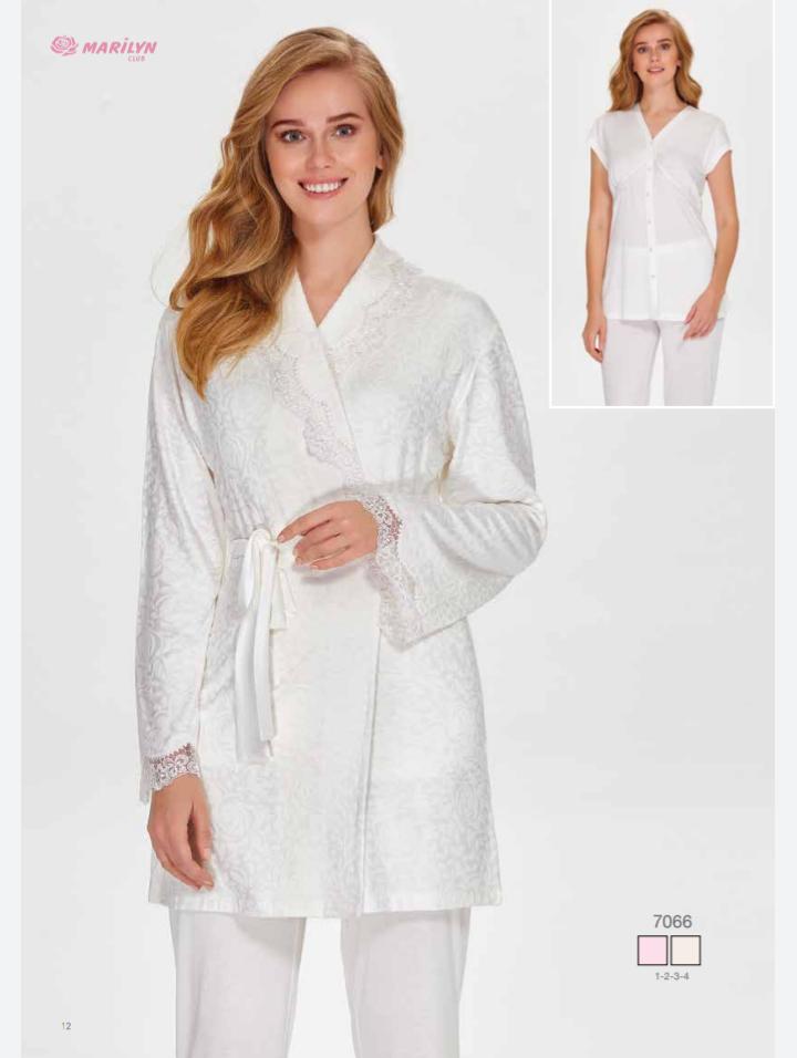 Model wearing Popjammies Lace Trim Maternity Pajama Set in white, with lace-trimmed cardigan and matching pants.