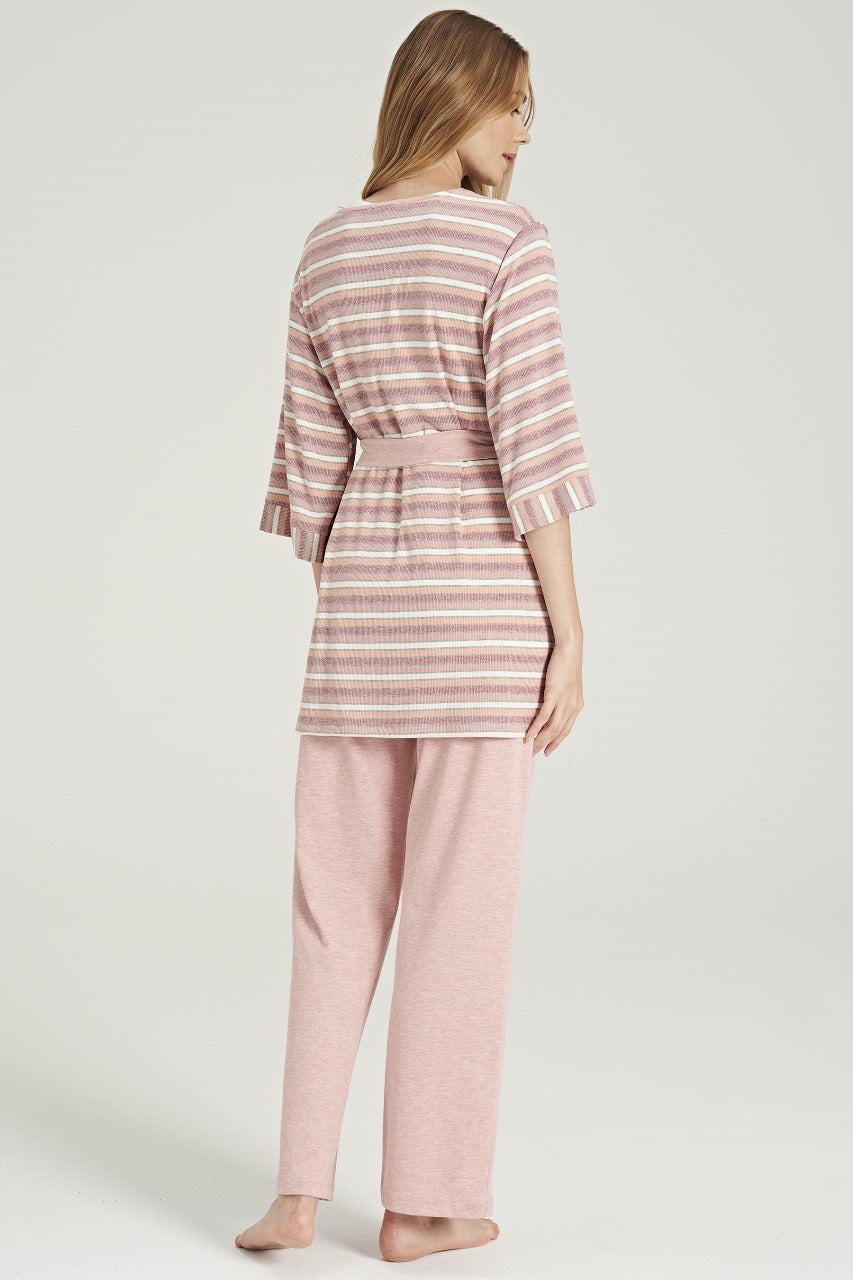 Woman wearing Popjammies pajama set with grey pants and striped cardigan from the back view.